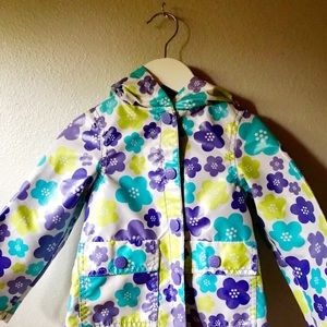 Bright flowered rain coat
